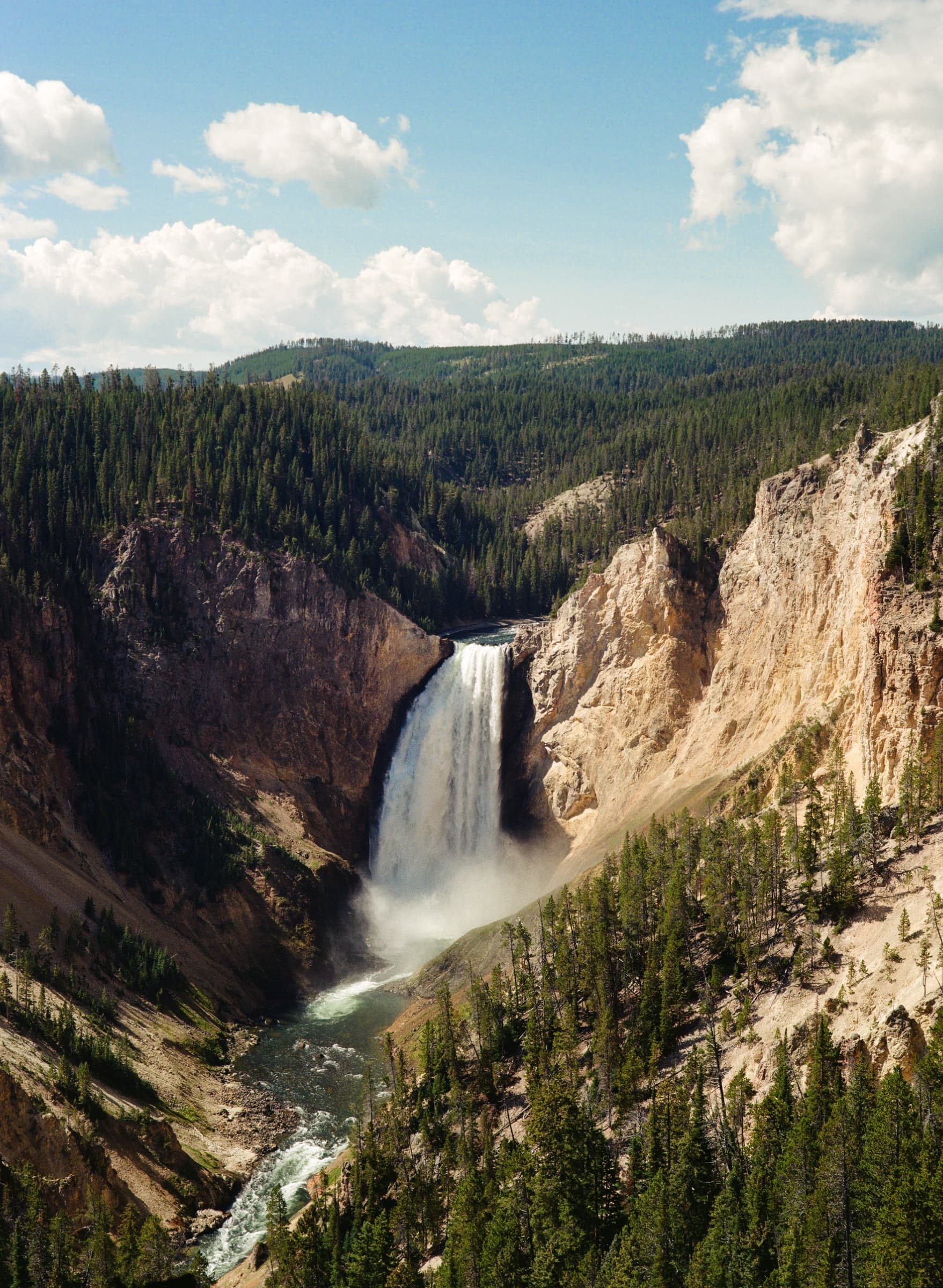 Lower Falls of the Yellowstone River plunging into the colorful canyon below