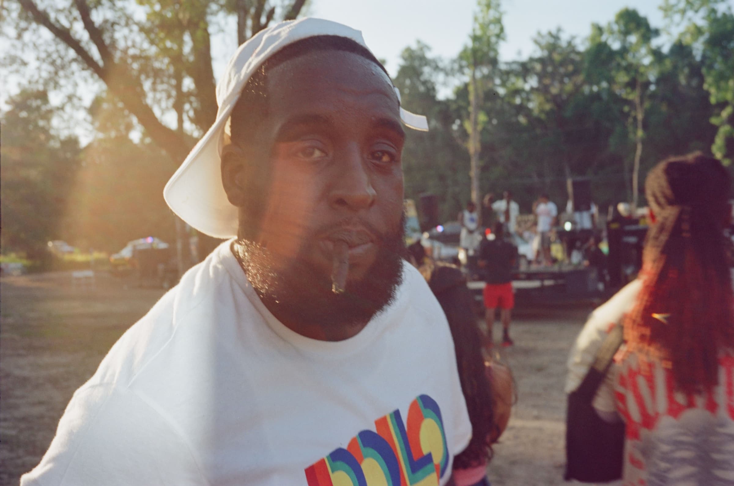 Person with a blunt in their mouth at Freaknik 2024